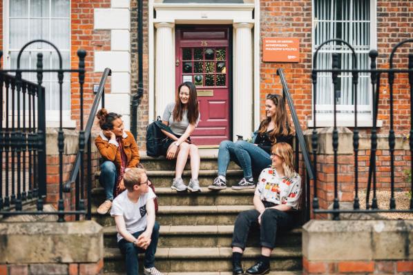 Students sitting on steps